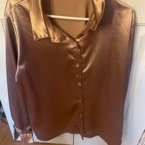 I’m selling a rose gold blouse